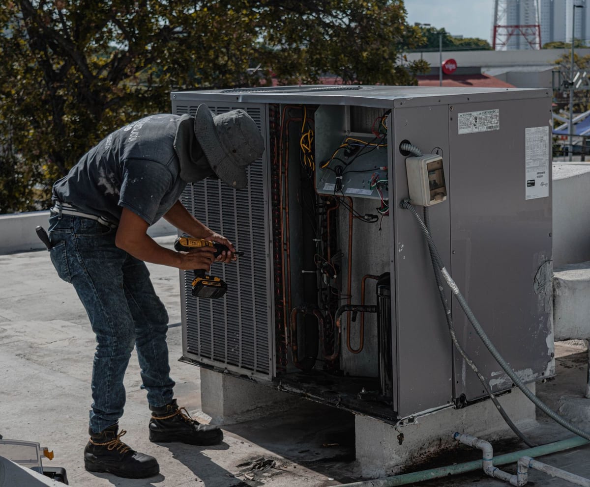 Technician performing a system tune-up